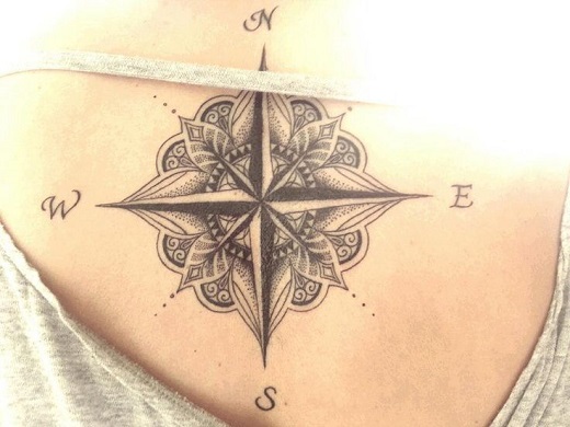 Grey Ink Compass Tattoo On Girl Upper Back