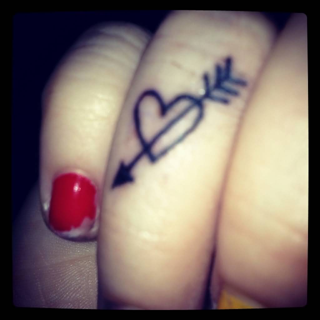 Heart And Arrow Tattoo On Finger