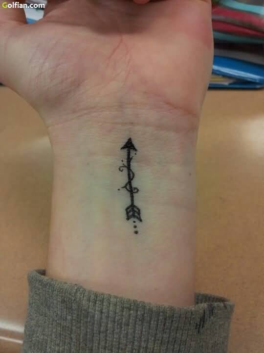 Incredibly Designed Black Arrow Tattoo On Wrist