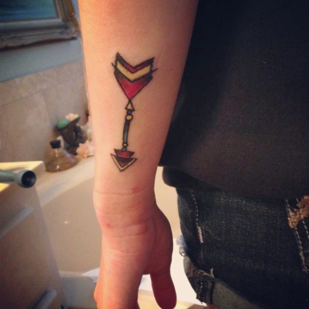 Amazing Colored Arrow Tattoo On Wrist