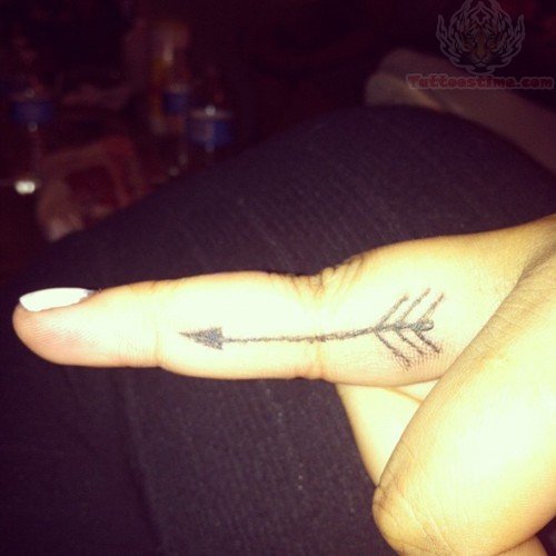 Light Black Colored Arrow Tattoo On Finger