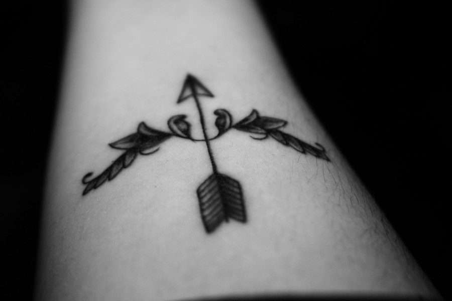 Lovely Bow And Arrow Tattoo On Forearm