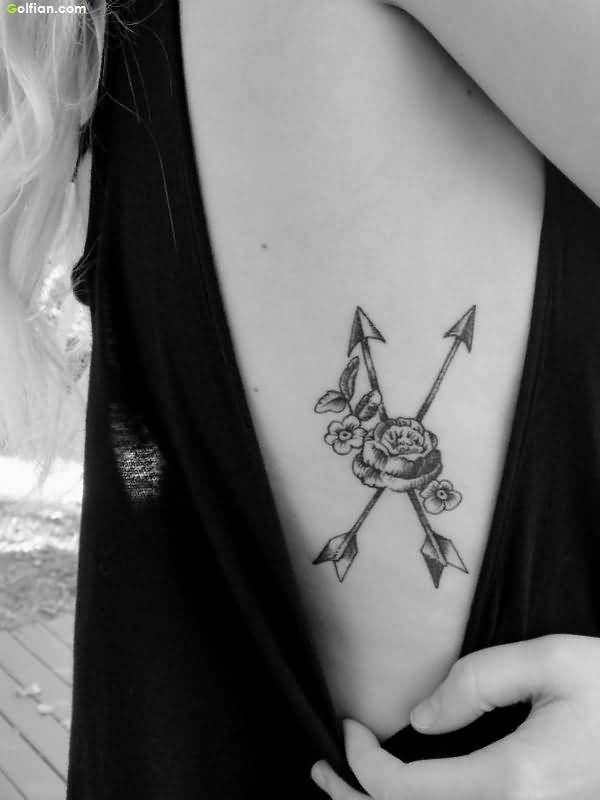 Lovely Rose With Arrow tattoo On Rib