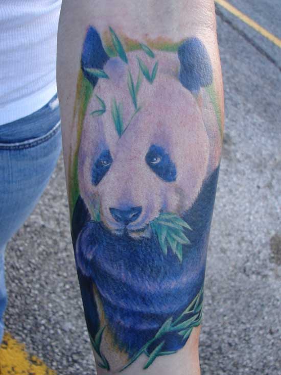 Magnificent Colorful Panda Eating Leaves Tattoo On Arm Sleeve