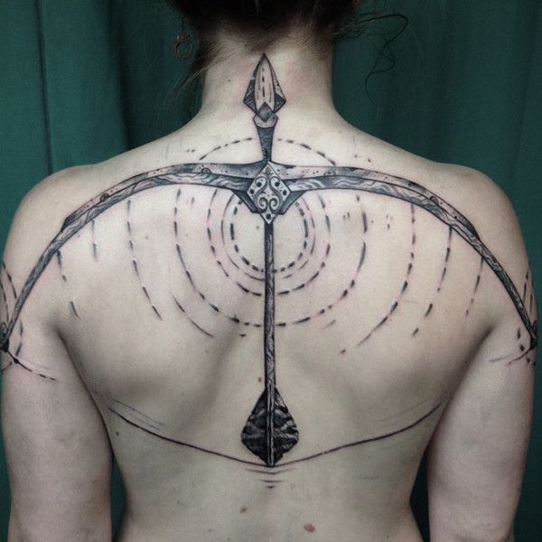 Magnificent Bow And Arrow Tattoo On Upper Back