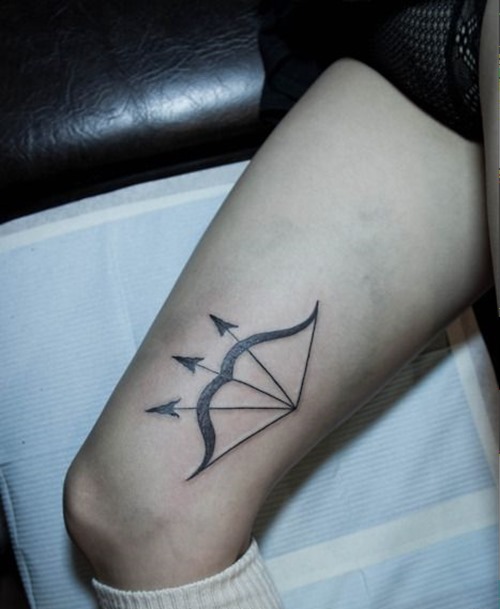 Magnificent Bow With Triple Arrows Tattoo On Thigh