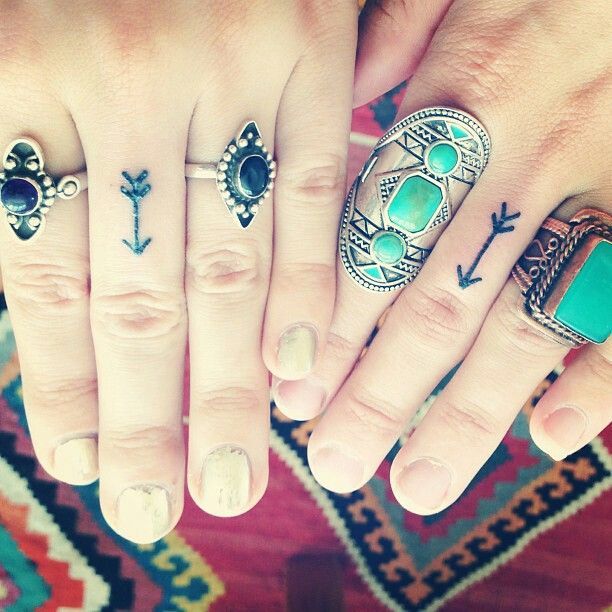 Matching Arrow Tattoos On Middle Finger