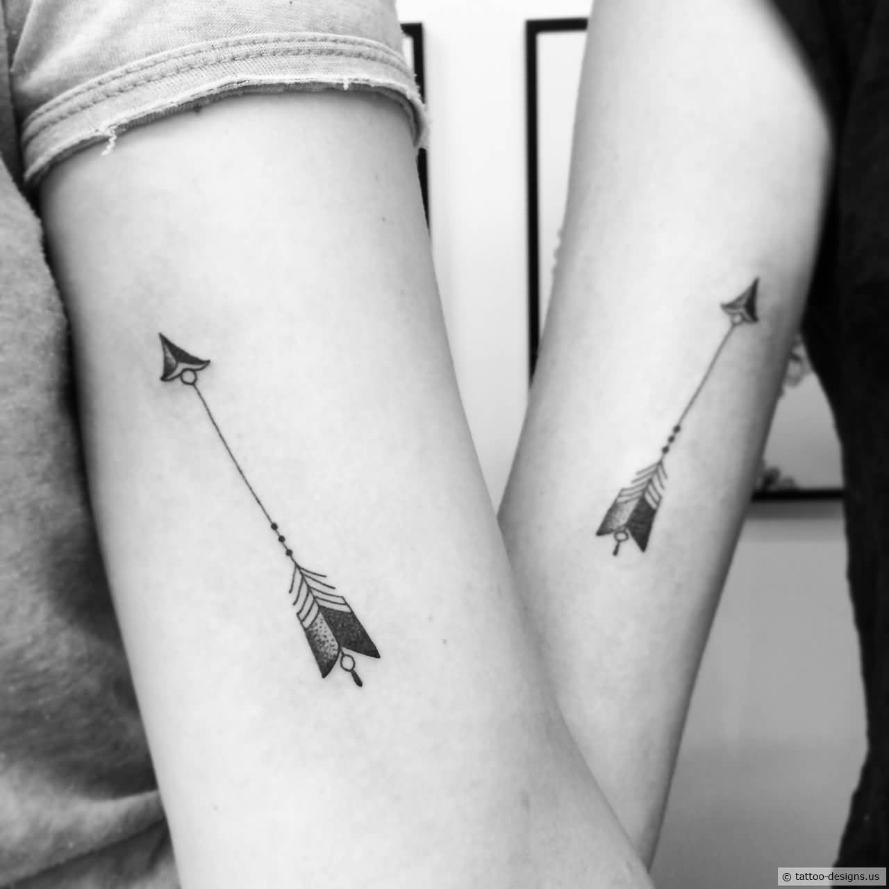 Matching Minimal Arrows Tattoos on Arm