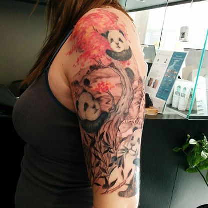 Mind Blowing Pandas On Tree Branch Tattoo On Half Sleeve For Girl