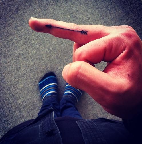 Minimal Black Arrow Tattoo On Finger