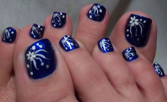 Navy Blue Toe Nails With White Flower Nail Art