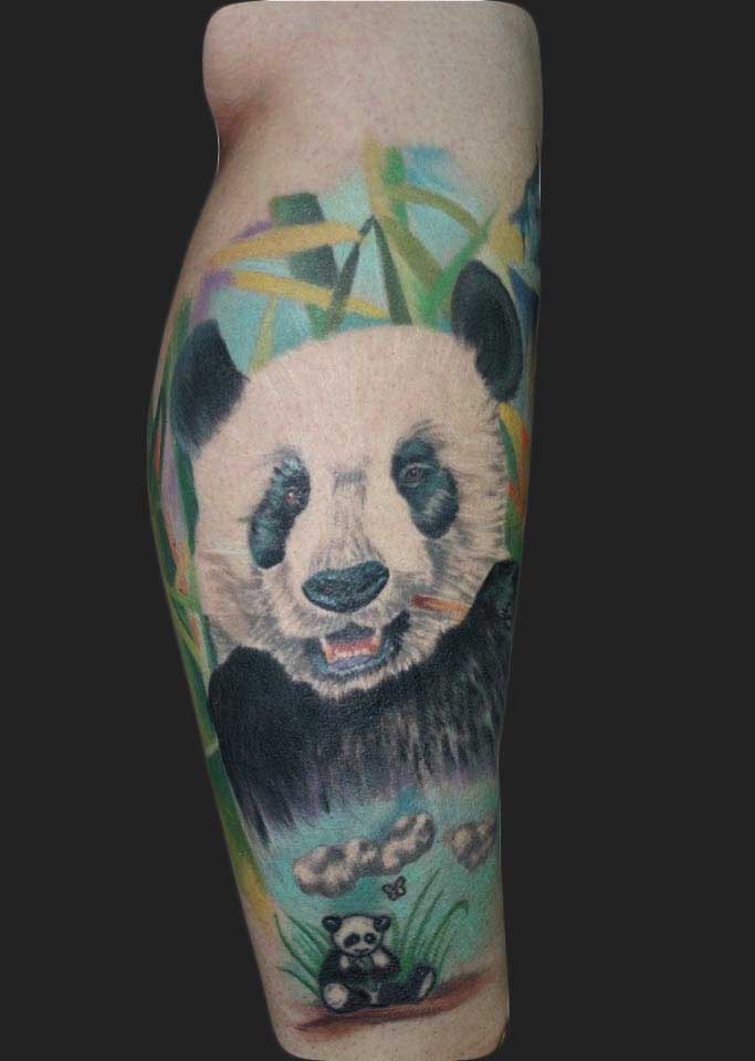 Nice Colorful Panda With Clouds And Leaves Tattoo By Jason Evans