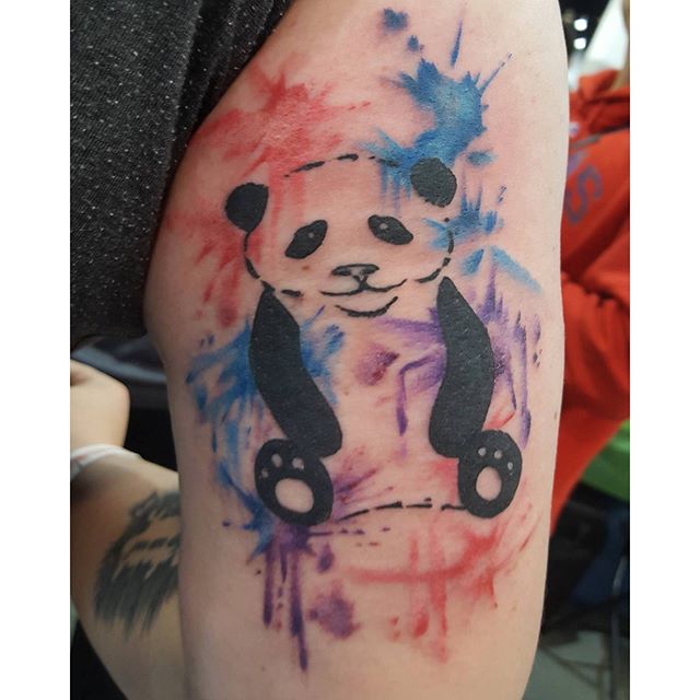 Nice Panda Sitting Watercolor Tattoo On Half Sleeve