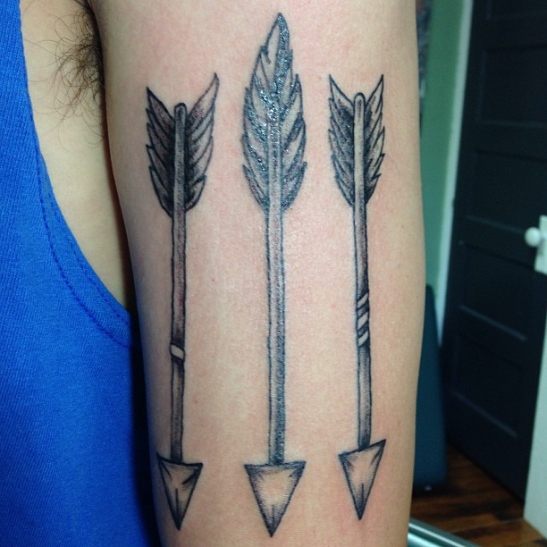 Old Grey Ink Arrow Tattoo On Half Sleeve For Men