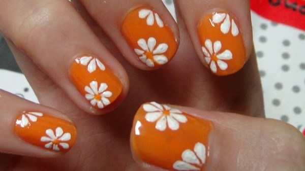 Orange Nails With White Simple Flower Nail Art