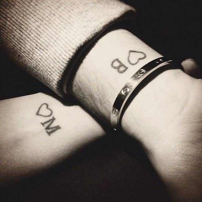 Outline Hearts And Name Letters Couple Tattoo