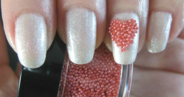Peach Caviar Heart Accent Nail Art
