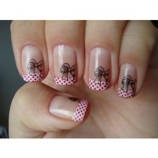 Pink And White Dotted French Tip Nail Art With Black Bow Design