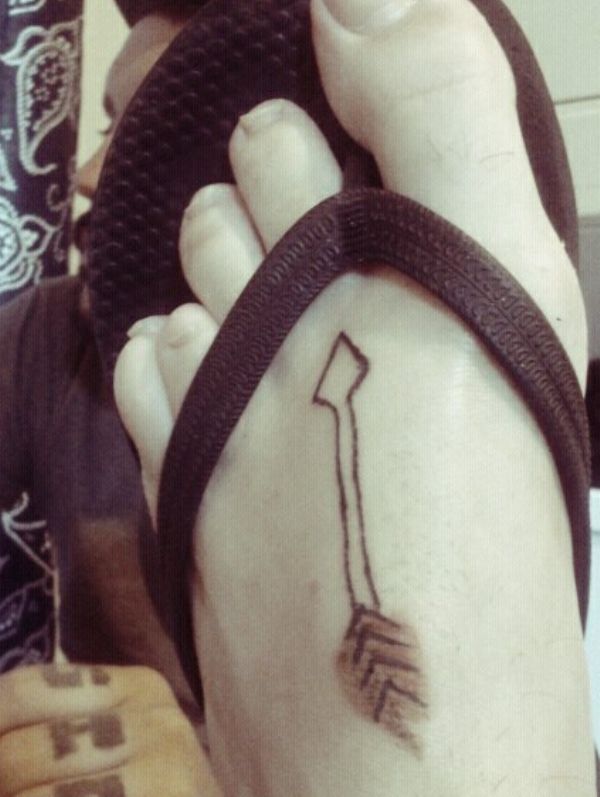 Pretty Arrow Tattoo On Foot