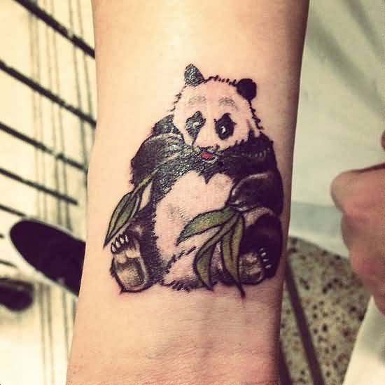 Realistic Panda Eating Leaves Tattoo On Wrist