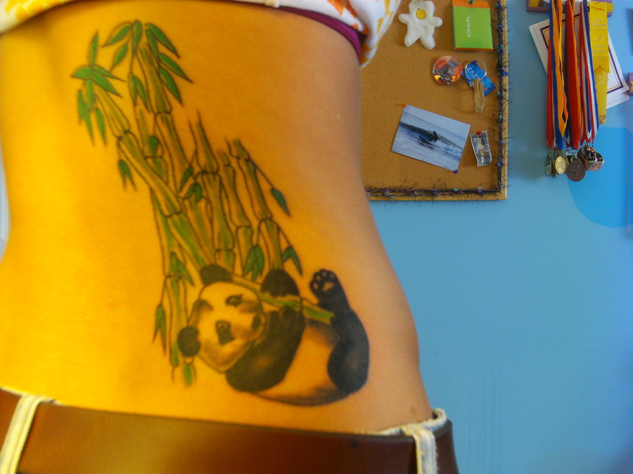Realistic Panda With Bamboos Tattoo On Rib