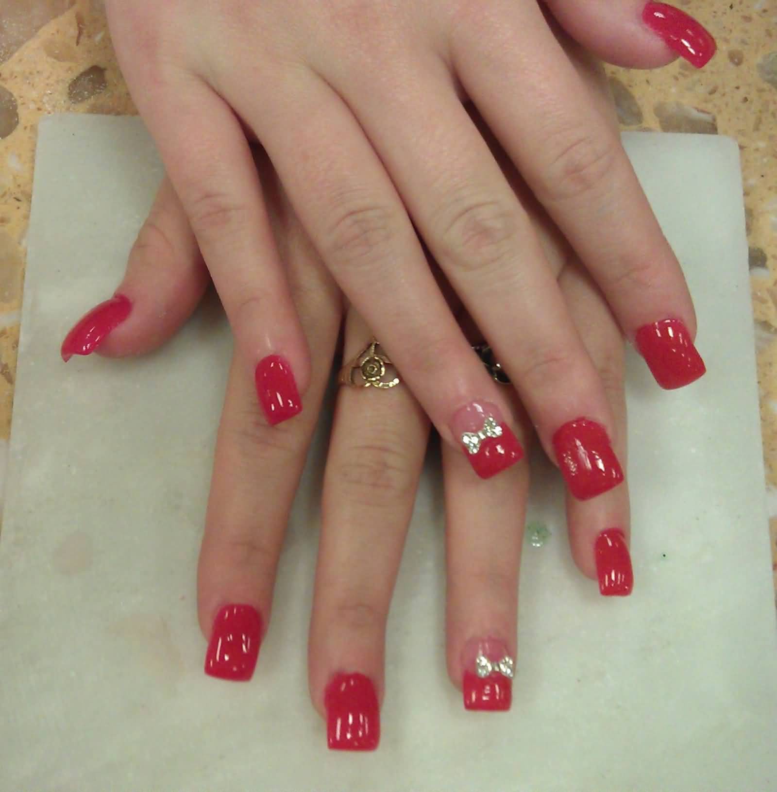 Red Glossy Nails With 3d Bow Nail Art
