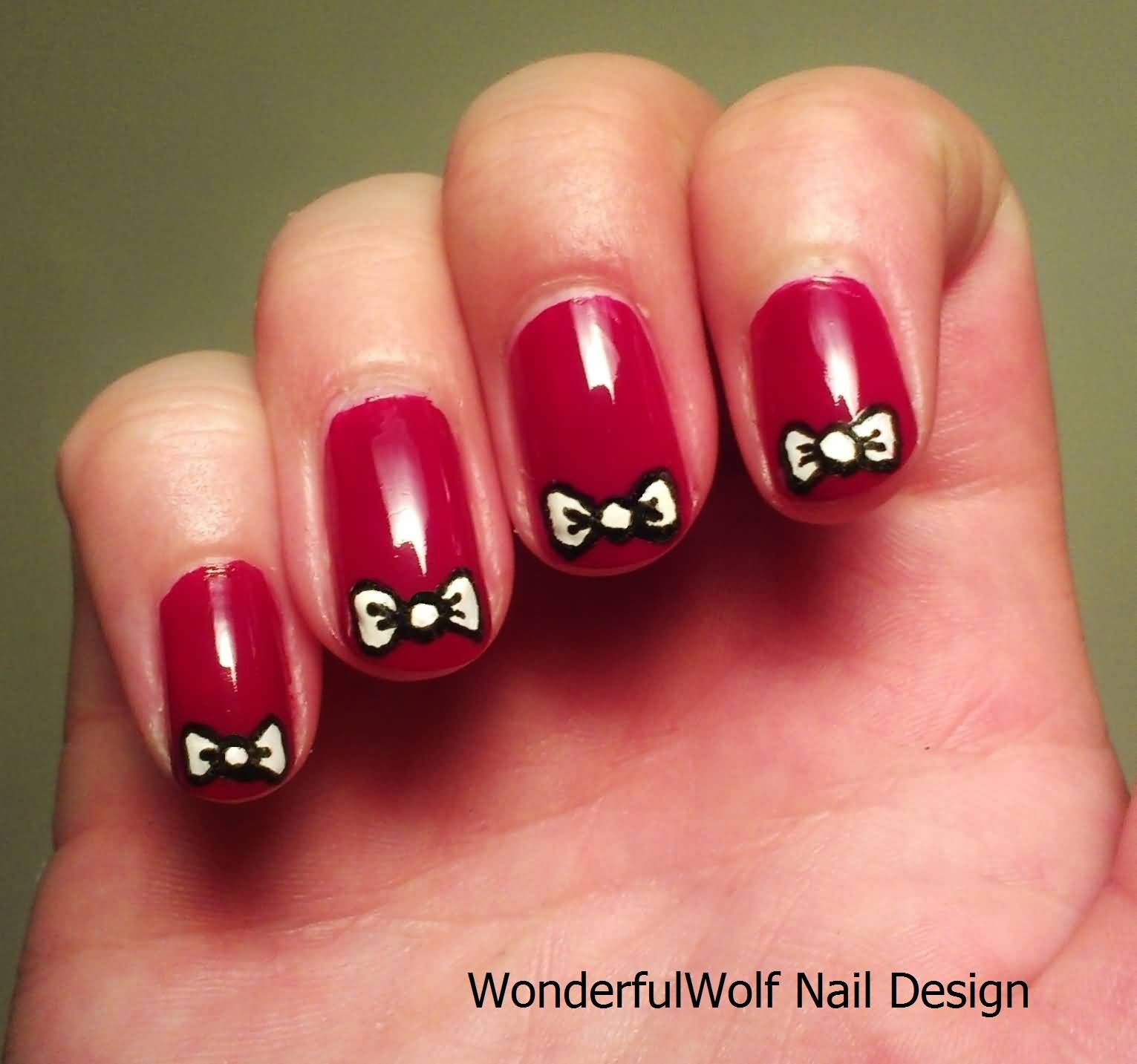 Red Glossy Nails With White Bow Nail Art