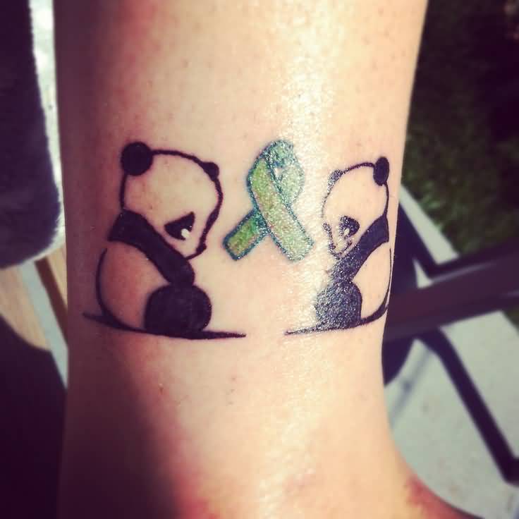 Sad And Happy Panda With Breast Cancer Ribbon Tattoo On Leg