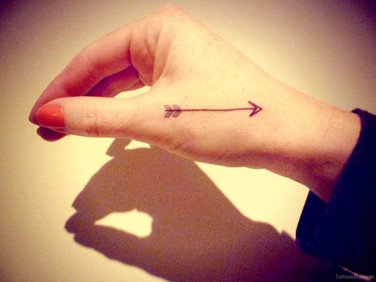 Simple And tiny Arrow On Hand Tattoo For Girl