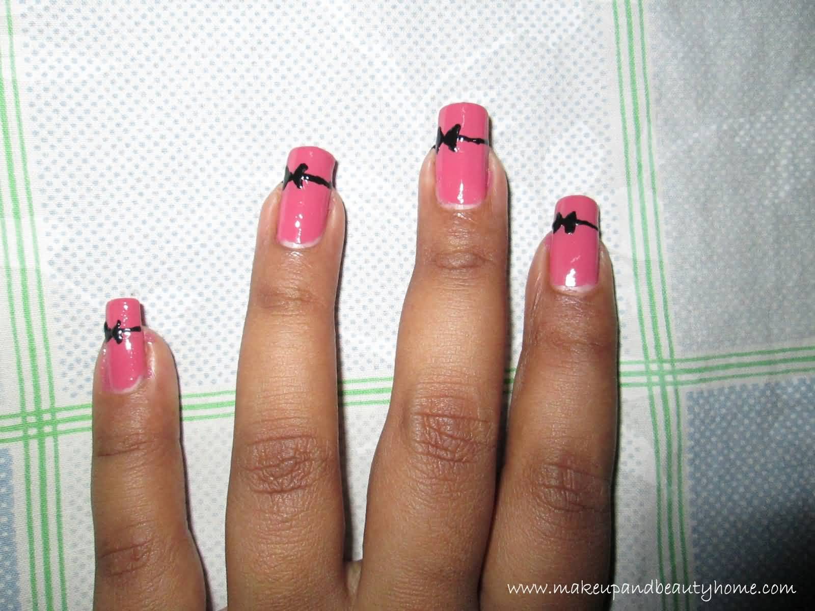 Simple Black Bow Nail Design On Pink Nails
