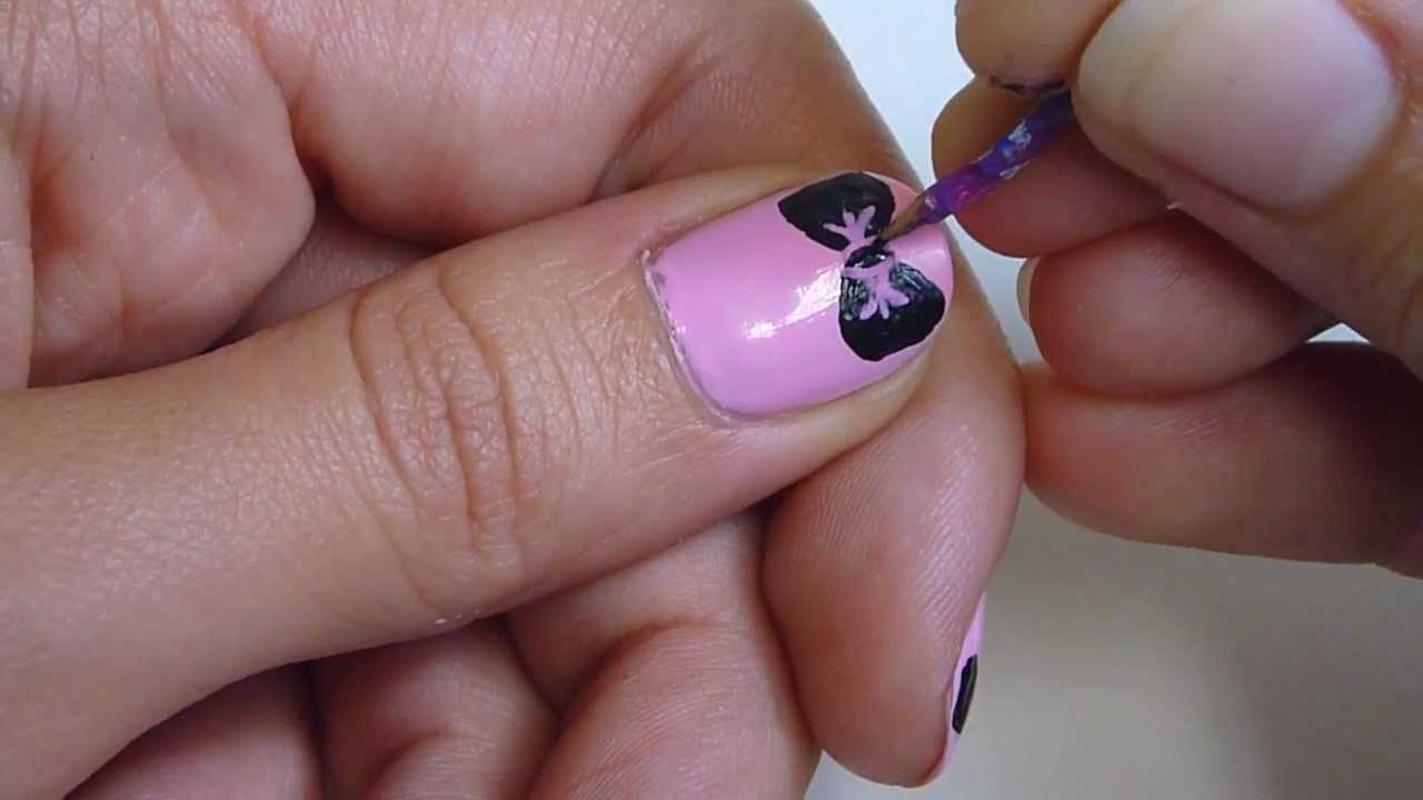 Simple Bow Nail Art On Pink Nail