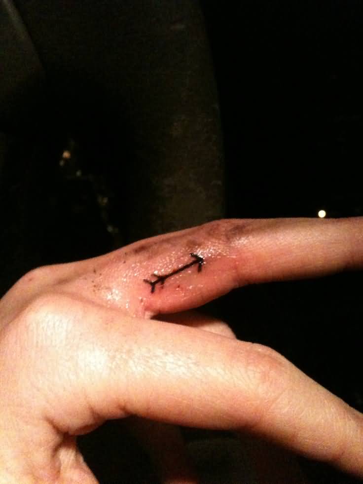 Small Arrow Tattoo On Finger For Men