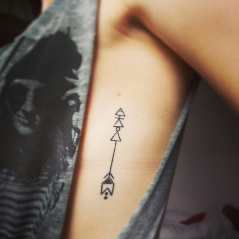 Small Arrow Tattoo On Rib
