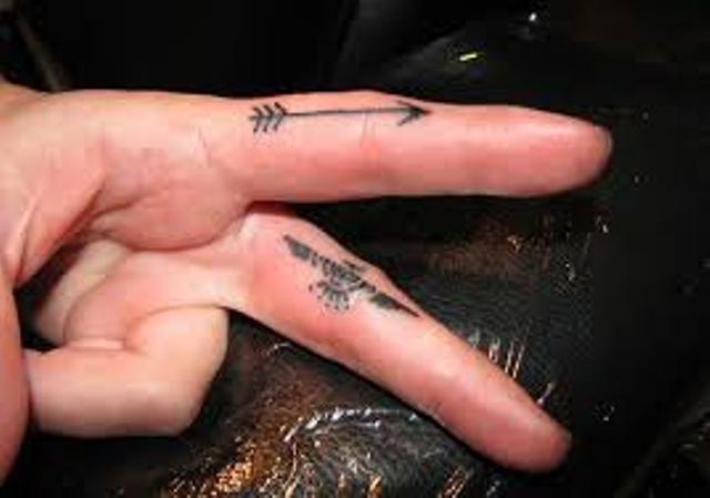 Small Arrow Tattoos On Both Fingers