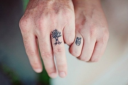 Small Tree And Owl Couple Tattoo On Fingers