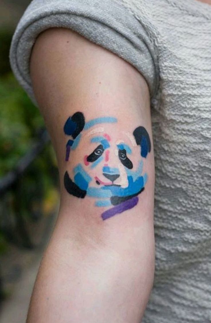 Stylized Watercolor Panda Face Tattoo On Bicep