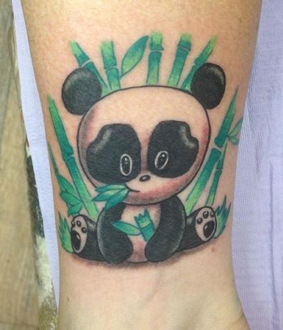 Super Cute Baby Panda Eating Bamboos Tattoo On Wrist
