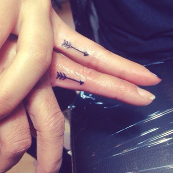Sweet Arrows Tattoo On Fingers