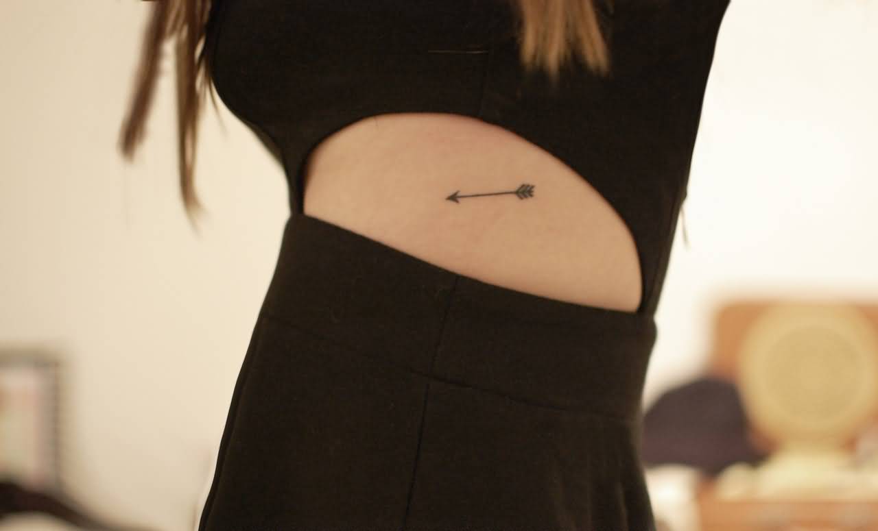 Sweet Tiny Black Arrow Tattoo On Rib