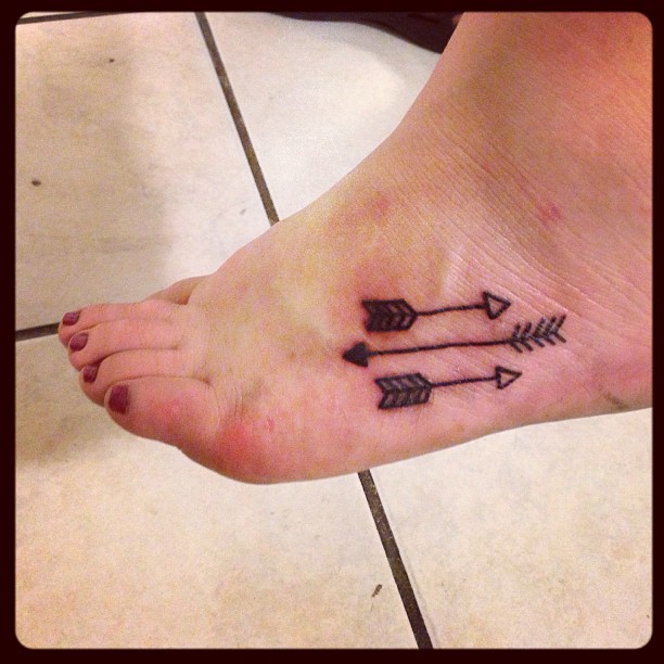 Three Arrows Tattoo On Foot For Women