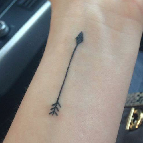 Tiny Arrow Tattoo By Ashley Rekards
