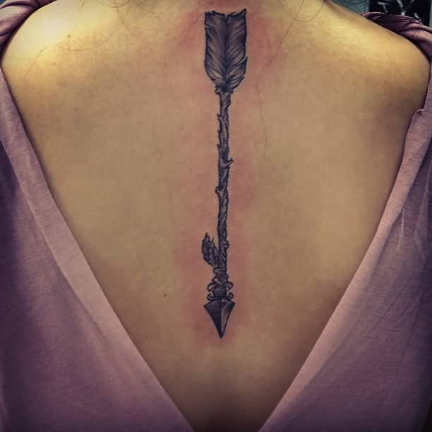Traditional Arrow Tattoo On Back For Ladies