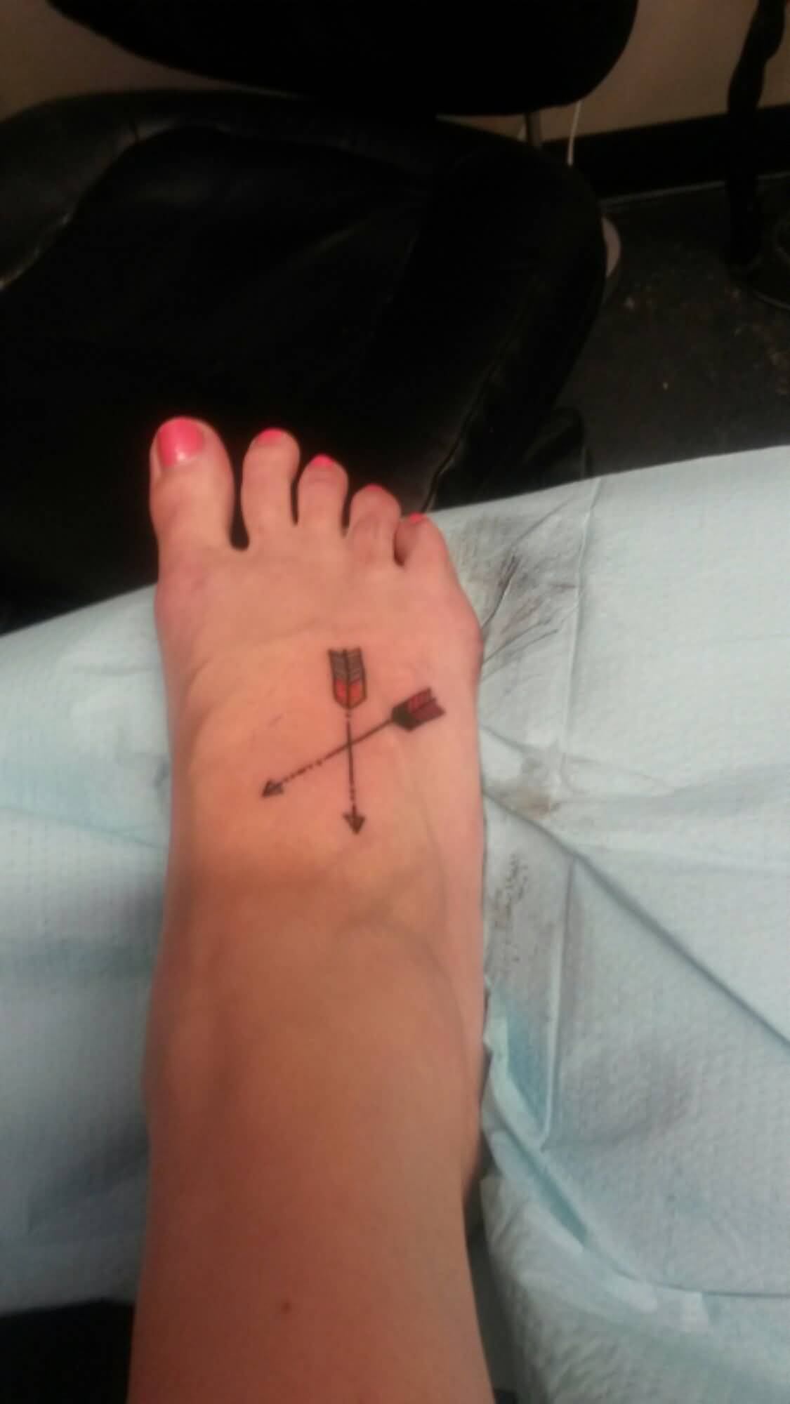 Two Crossed Arrow Tattoo On Foot