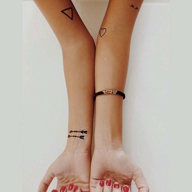 Two Tiny Arrows Tattoo On Wrist