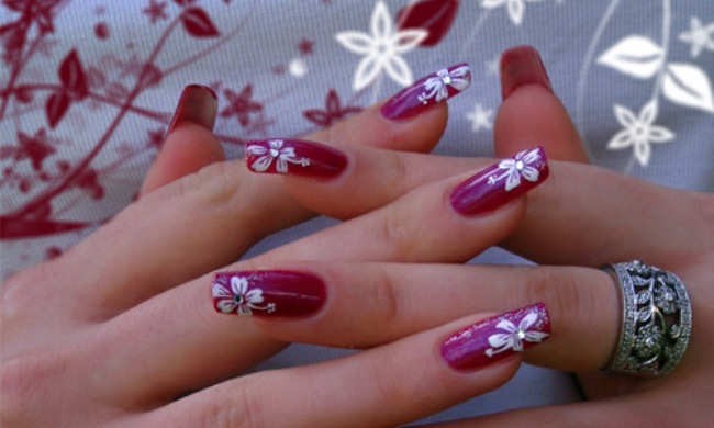 White Flower Nail Art On Purple Nails With Rhinestones