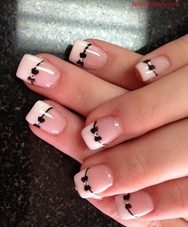White French Tip Nail Art With Black Bows Design