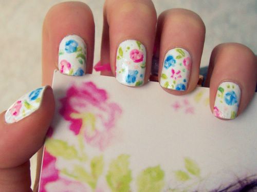 White Nails With Pink And Blue Flower Nail Art