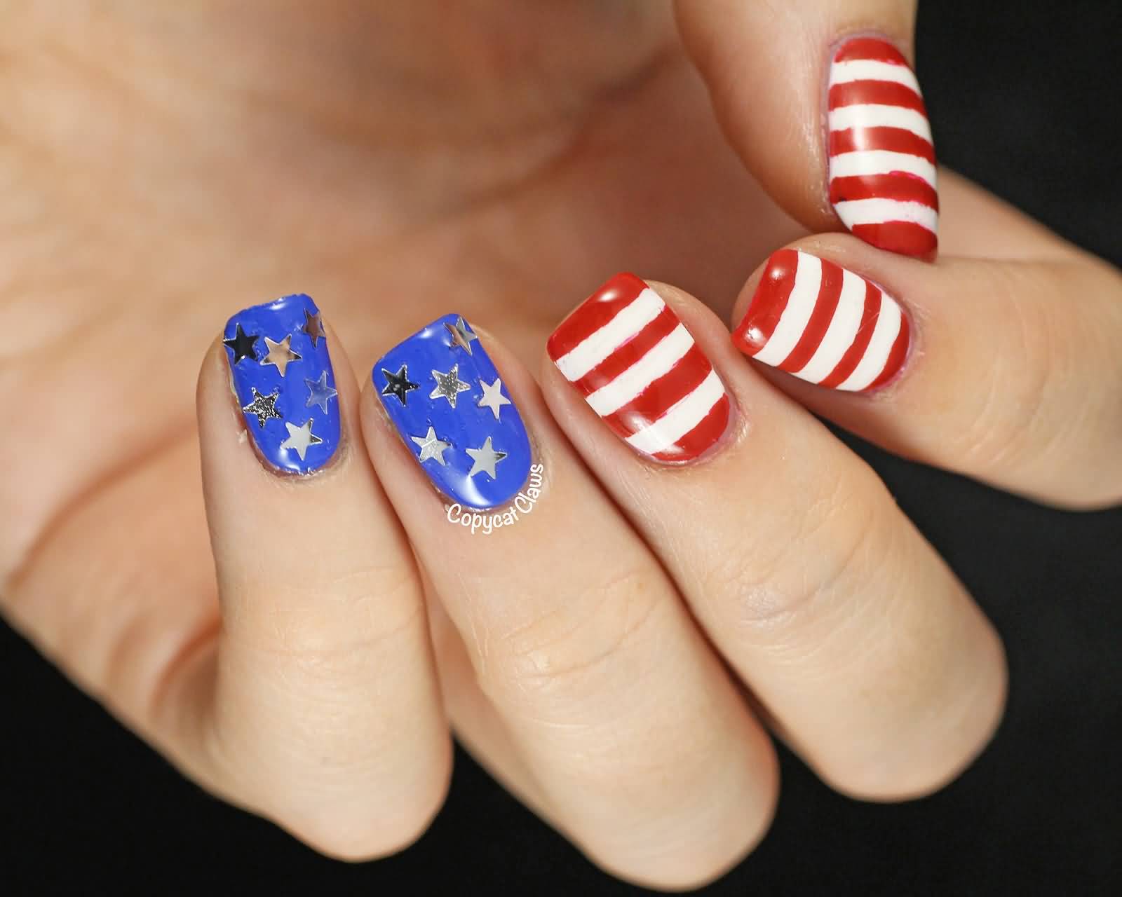 White Stripes On Red Nails And Blue Nails With Stars Fourth Of July Nail Art