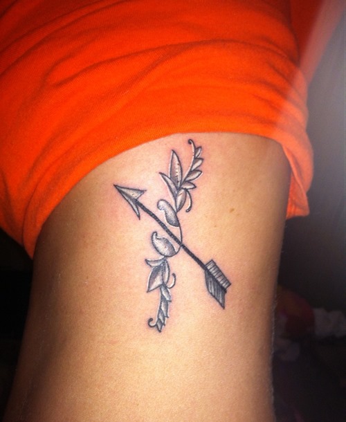 Wonderful Arrow Tattoo On Rib For Girls