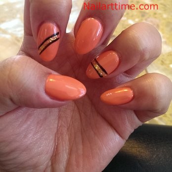 Almond Shape Orange Acrylic Nail Art With Golden Glitter Strip Design